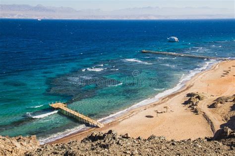 Empty beach in Taba, Egypt stock photo. Image of clouds - 112690826