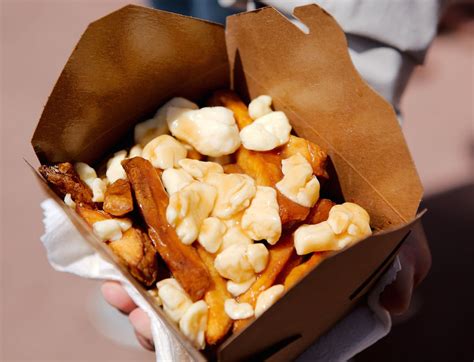 History of poutine: How the messy trio became Canada's most iconic dish