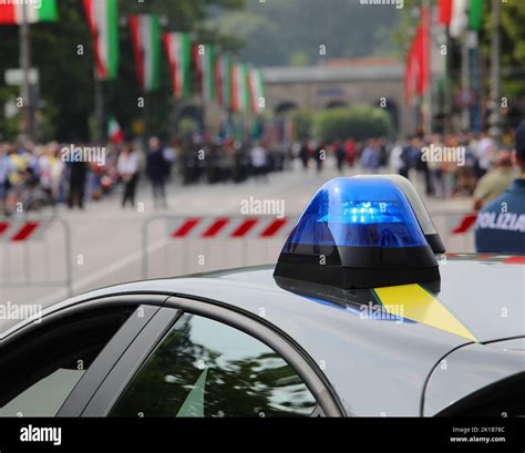 Police car siren during outdoor demonstration and many flags Stock ...