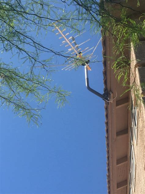 Outdoor HDTV antenna installation in Goodyear, AZ. Trees close by can ...