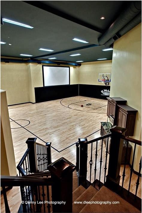 Basketball court in the basement... My husband would love to have this ...