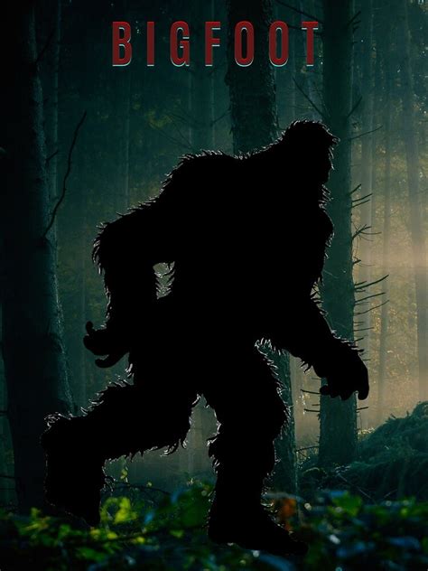 "Bigfoot sasquatch walking through the dark forest mountain woods in ...