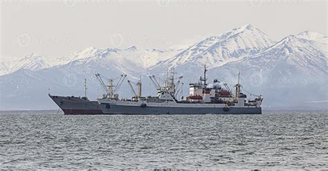 fishing trawler in the Bay on the roads 8054316 Stock Photo at Vecteezy