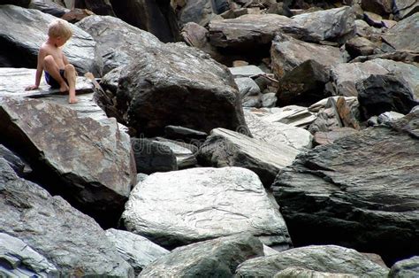 Boy On The Rocks Picture. Image: 1454250