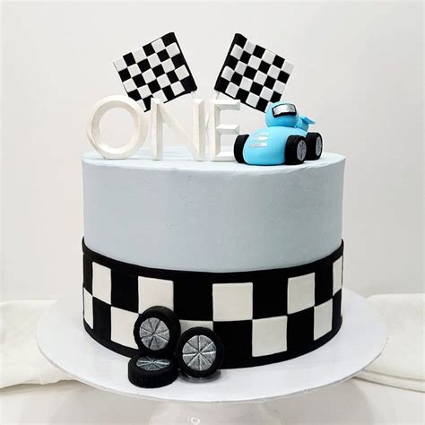 Blue race car cake in 2023 | Cars birthday cake, Race car cakes, Race ...