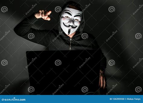 Hacker with anonymous mask editorial image. Image of fight - 126395930