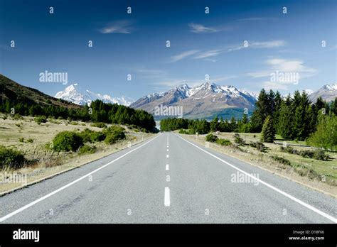 Paved road in rural landscape Stock Photo - Alamy