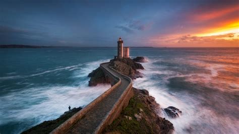 Sunset over Petit Minou lighthouse, Plouzané, Finistère, Brittany ...