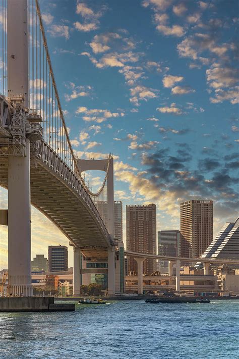 Japanese Rainbow Bridge at sunset in Japan. Photograph by Kuremo Japan