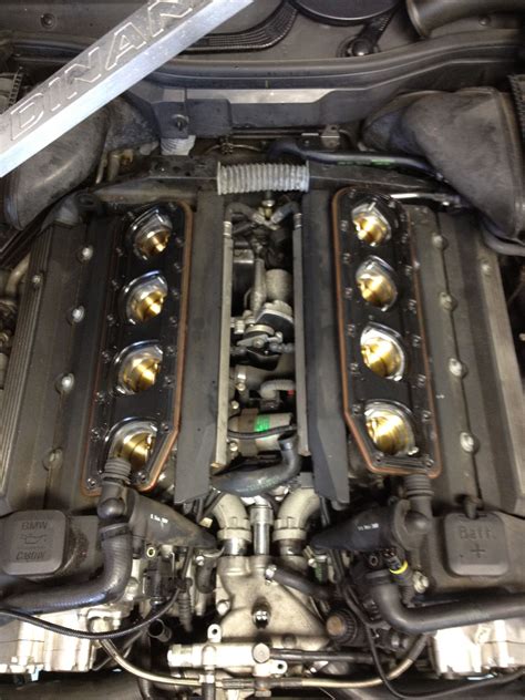 BMW E39 M5 4.9l V8 with engine cover off exposing the 8 individual ...