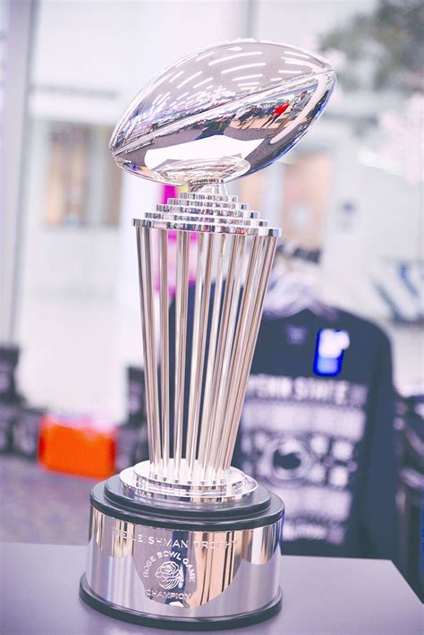 Selfies with the Rose Bowl trophy: Game officials show off hardware ...