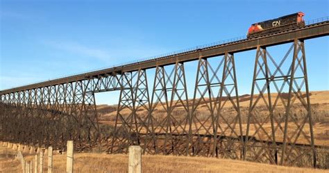 13 train cars derail off historic CN trestle bridge near Wainwright in ...