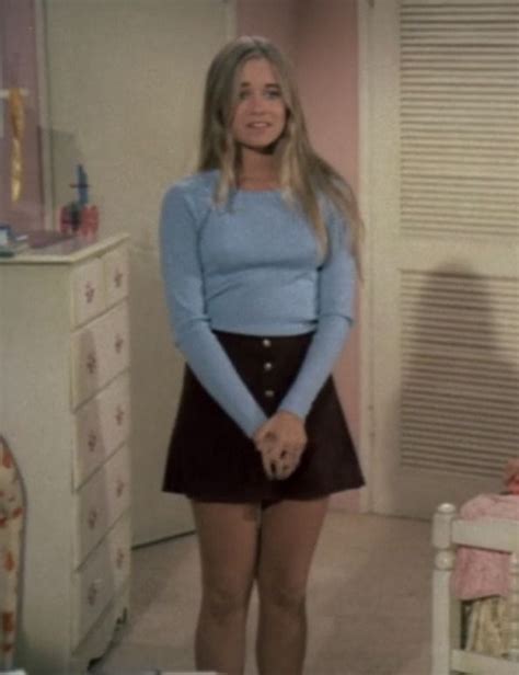 Maureen McCormick as Marcia on “The Brady Bunch” wearing a light blue ...