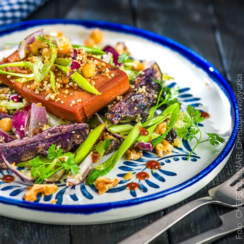 Vegan Leberkäse with purple truffle potato salad, couscous and walnuts ...