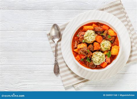 Beef Stew with Dumplings in Bowl, Top View Stock Photo - Image of ...