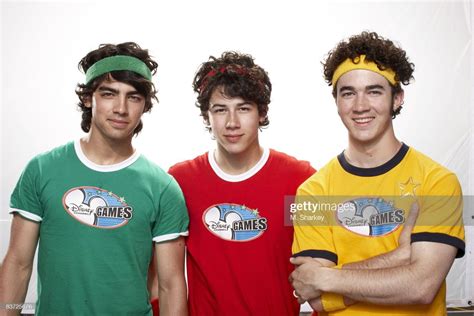 The Jonas Brothers are photographed at the Disney Games in the Epcot ...