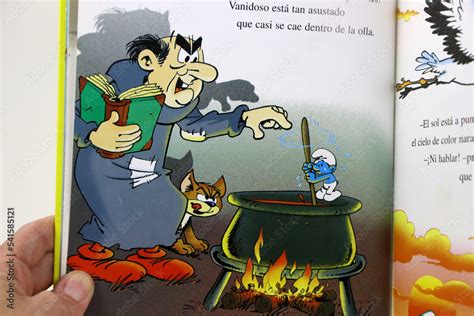 The Smurfs storybook. The wizard Gargamel and his cat Azrael in his ...