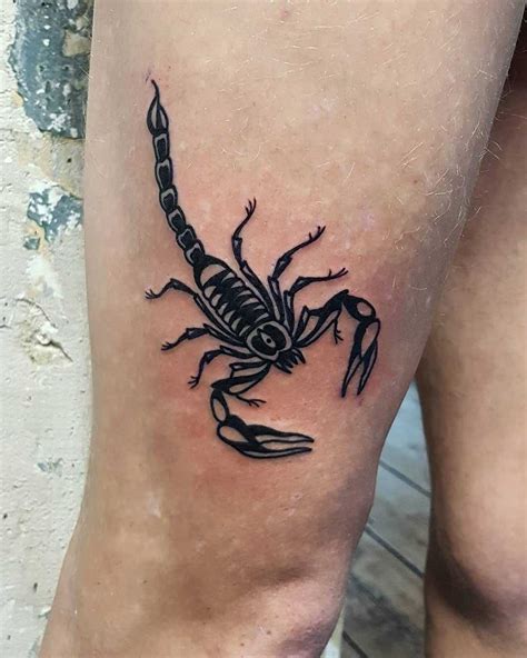 A black scorpion tattoo on the lower part of the right thigh | Tattoos ...