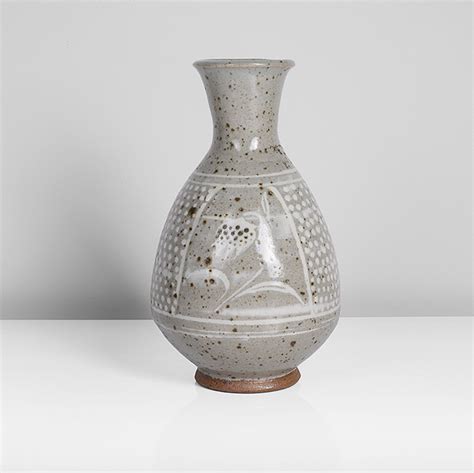 A grey stoneware 'fritillary' vase made by Bernard Leach in 1965 sold ...