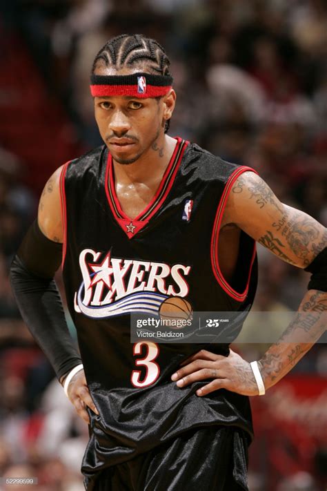 Allen Iverson of the Philadelphia 76ers looks on against the Miami ...