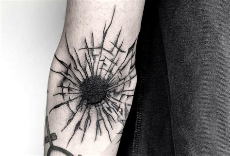 Glass Bullet Hole Tattoo