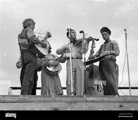 Roy Acuff performing his first tour with the Grand Ole Opry outdoors in ...