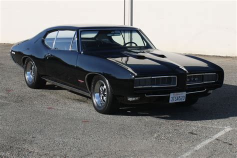 Black 1968 GTO with the optional Hide-away Headlamps. | Gto, Classic ...