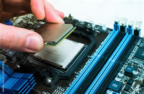 Installing the CPU into the motherboard Stock Photo | Adobe Stock