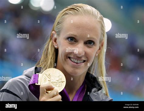 Dana Vollmer of USA poses with her gold medal after winning the women's ...