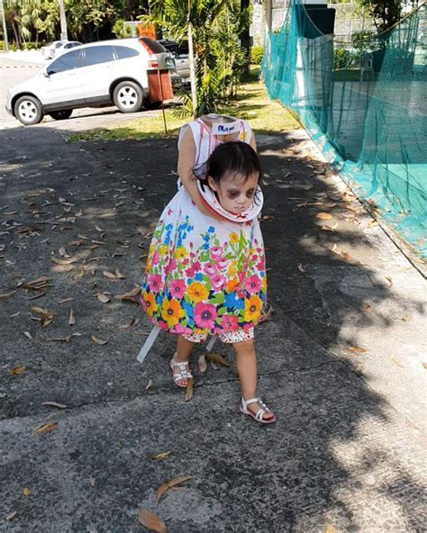 Little Girl Looks Headless in Homemade Halloween Costume