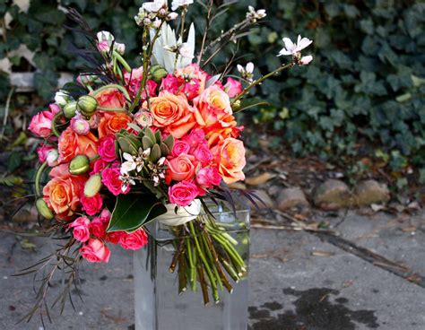 bouquet of roses, ranuculus, baby spray, poppies and blossoms ...