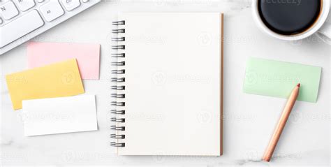 Top view of office table desk cozy work concept on bright marble white ...