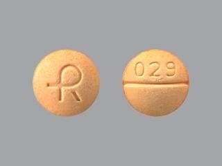 R 029 Pill Orange Round 7mm - Pill Identifier