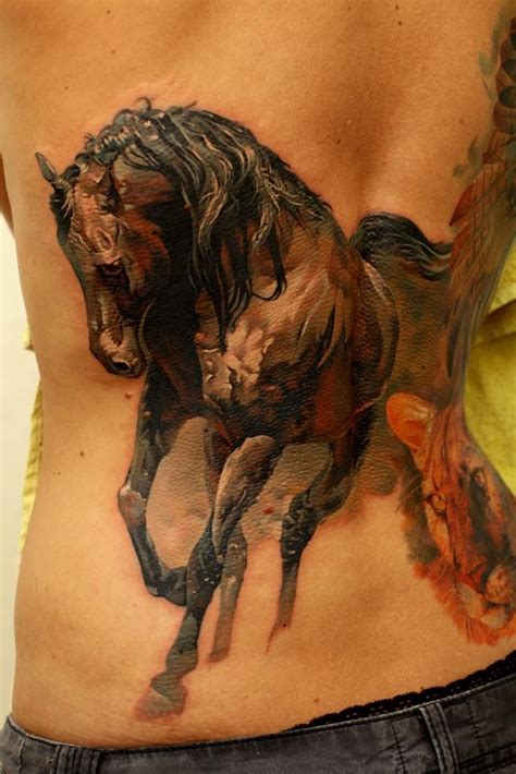 Great watercolor horse tattoo on back - Tattooimages.biz