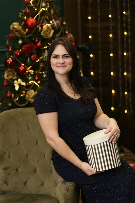 A Woman Sitting with a Laptop · Free Stock Photo