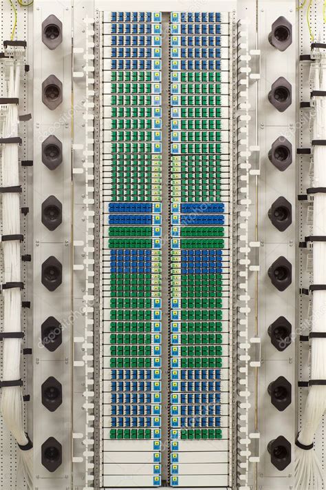 Fiber optic rack with high density of blue and green SC connectors ...