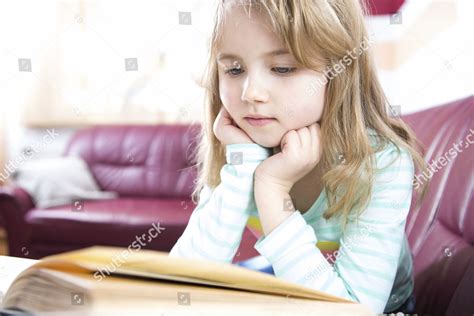 Model Released Little Girl Reading Book Editorial Stock Photo - Stock ...