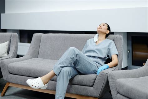 Photo Of Woman Resting On The Couch · Free Stock Photo