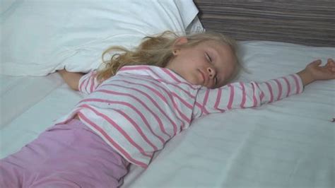 Smiley Sleeping Child Little Girl Smiling Stock Footage Video (100% ...