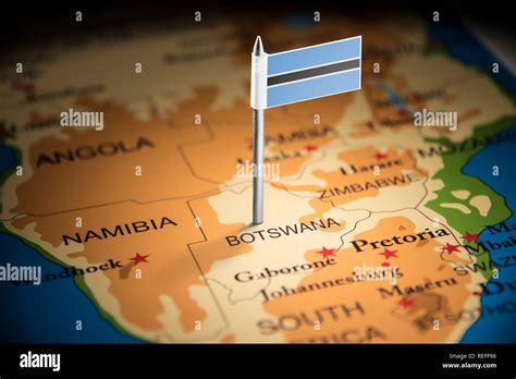 Botswana marked with a flag on the map Stock Photo - Alamy