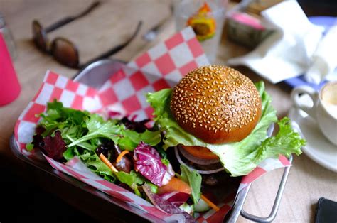 food, restaurant, combo, meal, burger, veggies, dressing, bun, table ...