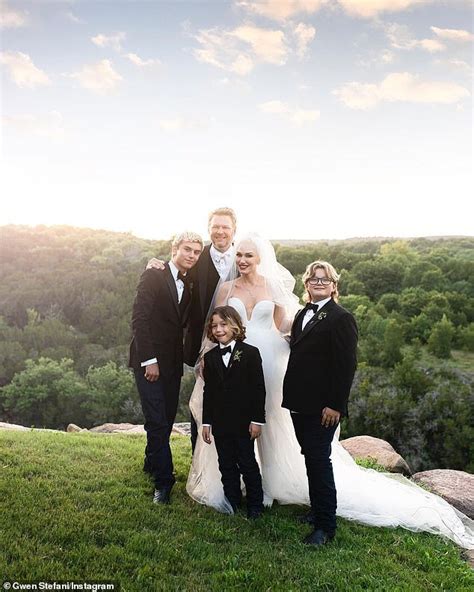 Gwen Stefani and new husband Blake Shelton pose with her suited-up sons ...