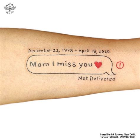 a woman's arm with a message on it that says mom i miss you not delivered