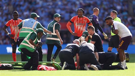 Luton Town captain Tom Lockyer feeling 'okay' after collapsing on pitch ...