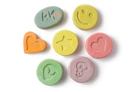 Ecstasy Tablets White Background Stock Photo by ©YAYImages 258116216