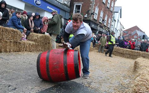 Hundreds gather for Denbigh's traditional Boxing Day barrel roll ...