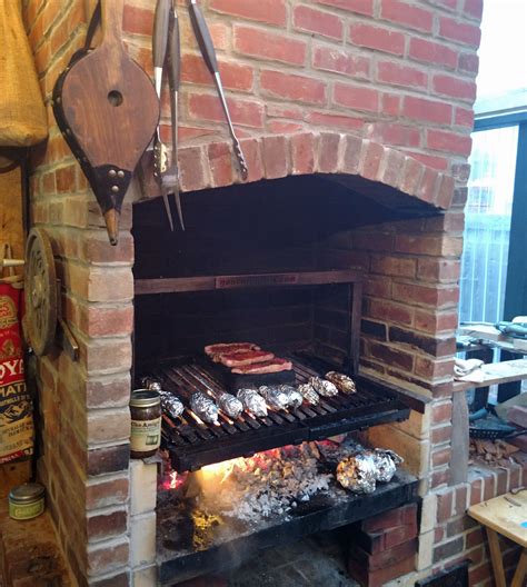 Gaucho Grills Insert in a fireplace installation. A Beautiful wood ...