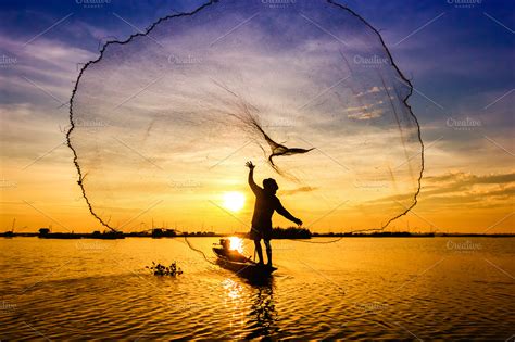 Fishermen throwing net fishing stock photo containing human and ...