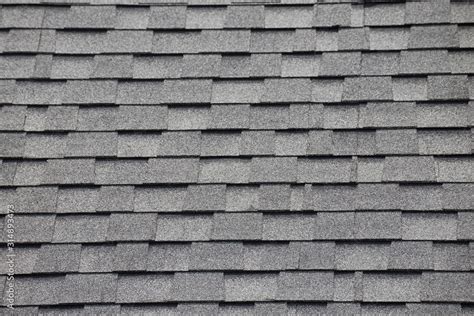 Roof shingles background and texture. grey and black asphalt tile of ...