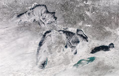 Satellite photos show wild lake effect clouds over freezing Great Lakes ...